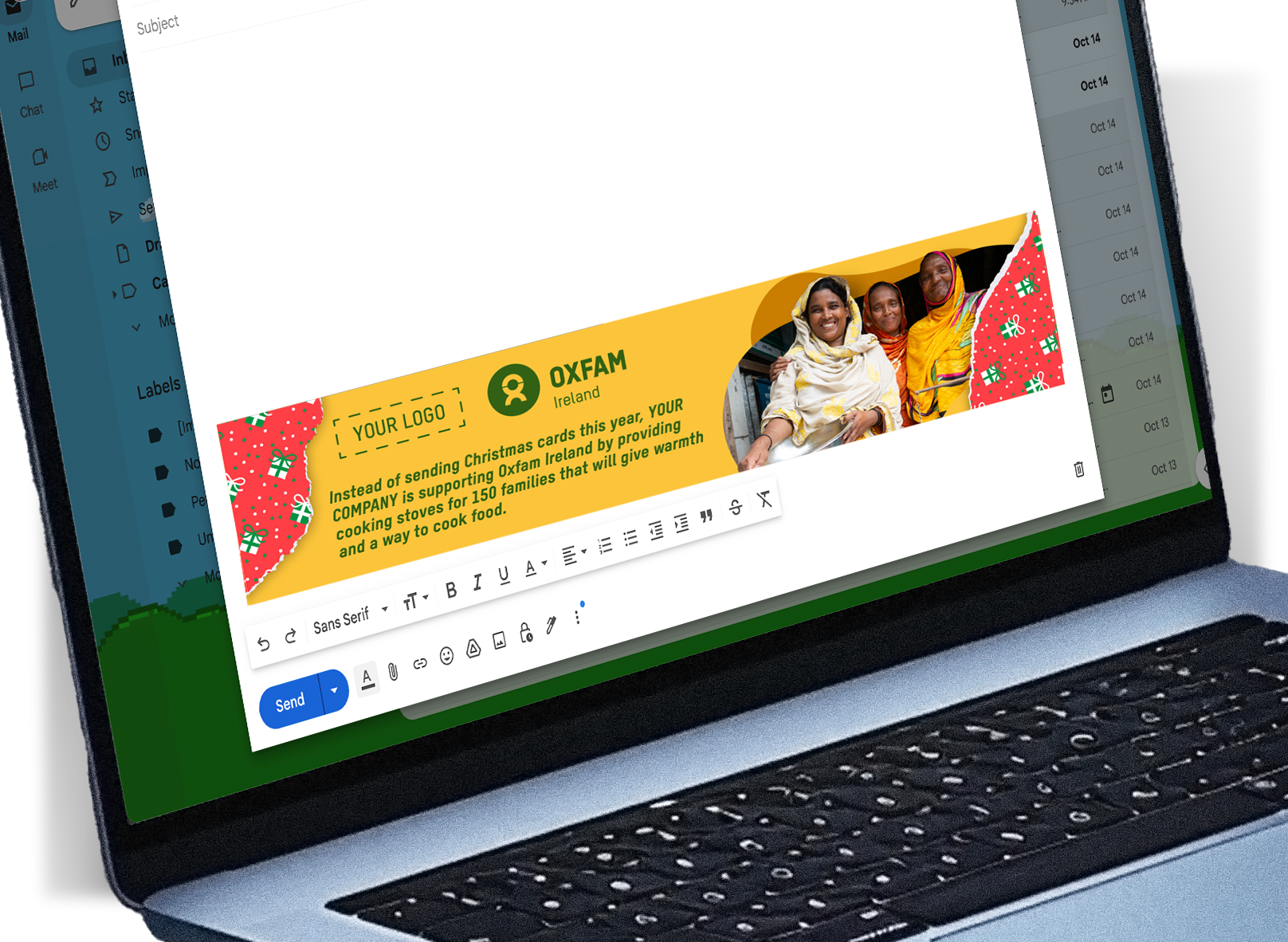 Image of a laptop with a new email open on the screen. You can see the Oxfam Corporate Unwrapped footer. The footer is festive yellow and and red highlighting the impact your gift has.